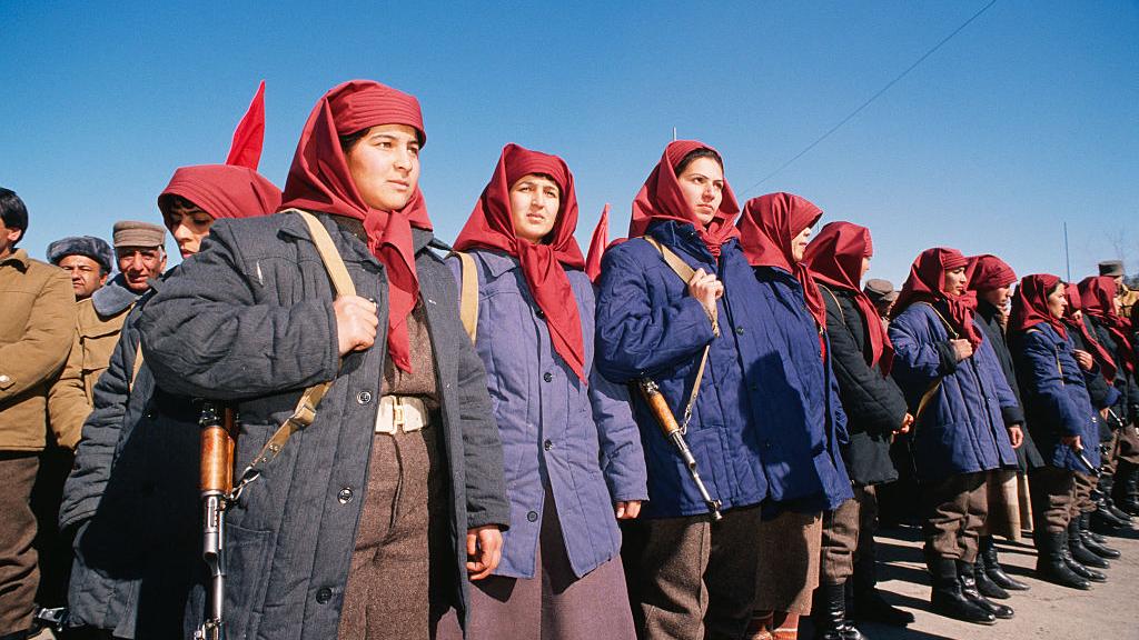 Armed women from one of the revolutionary militias defending the revolution against US backed jihadists