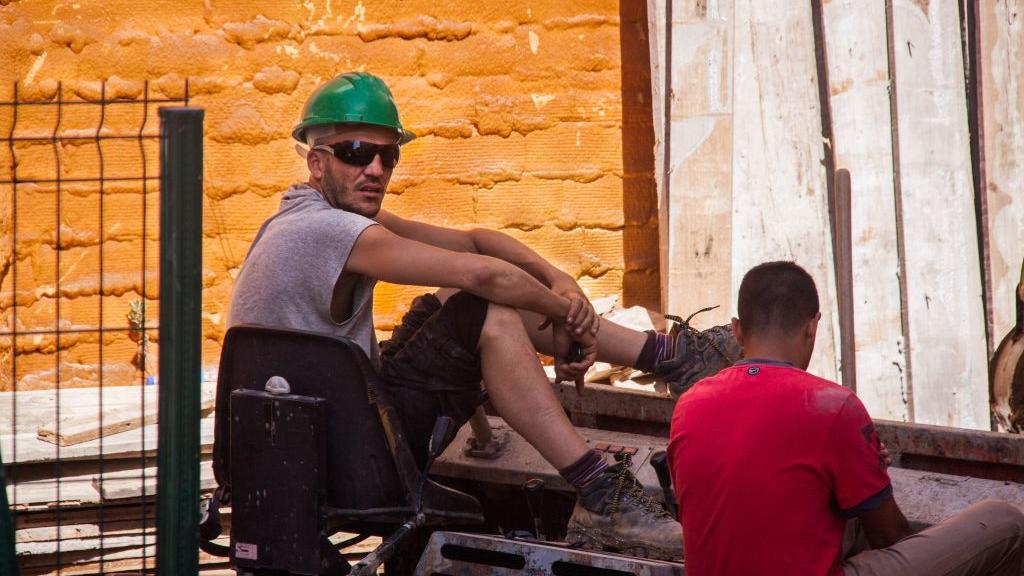 Construction workers in Marbella, Spain. Photo by Chris Gold. Used under CC license 2.0.