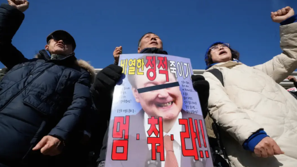 Members of South Korea’s opposition Democratic Party protest against President Yoon Suk-yeol outside the national assembly in Seoul.