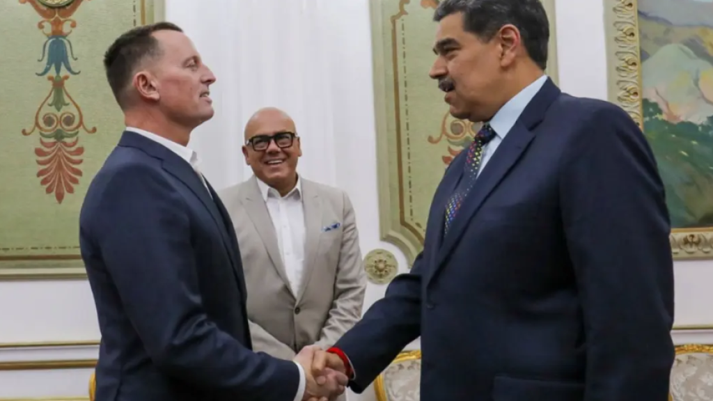 Venezuelan President Nicolas Maduro (right) greets the special envoy of US President Donald Trump, Richard Grenell, in Caracas. 