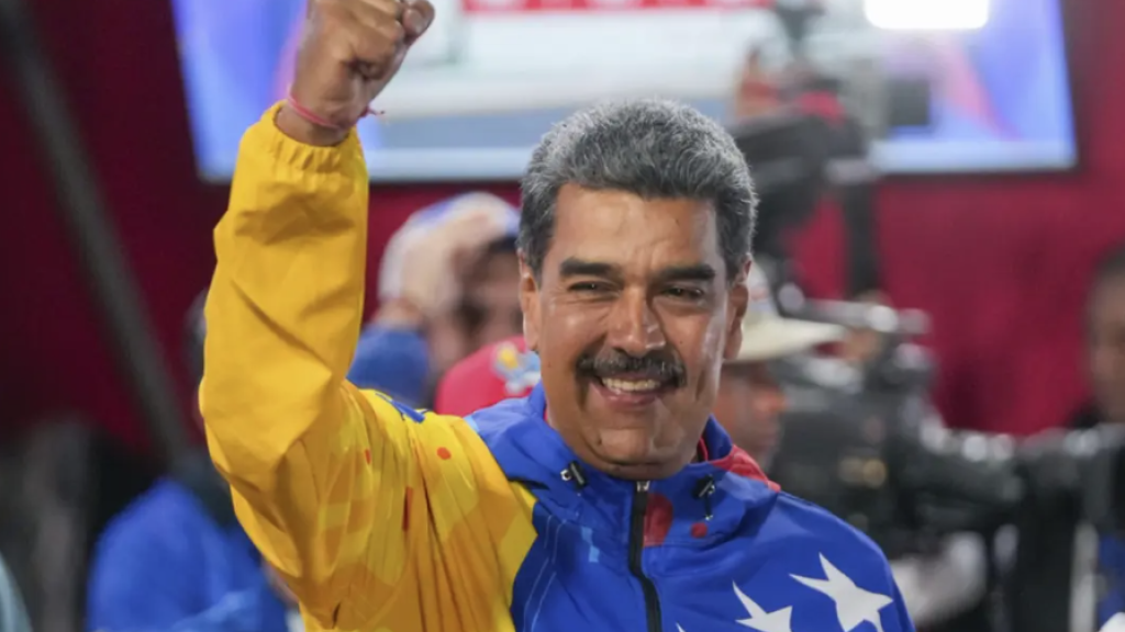 Maduro raising fist