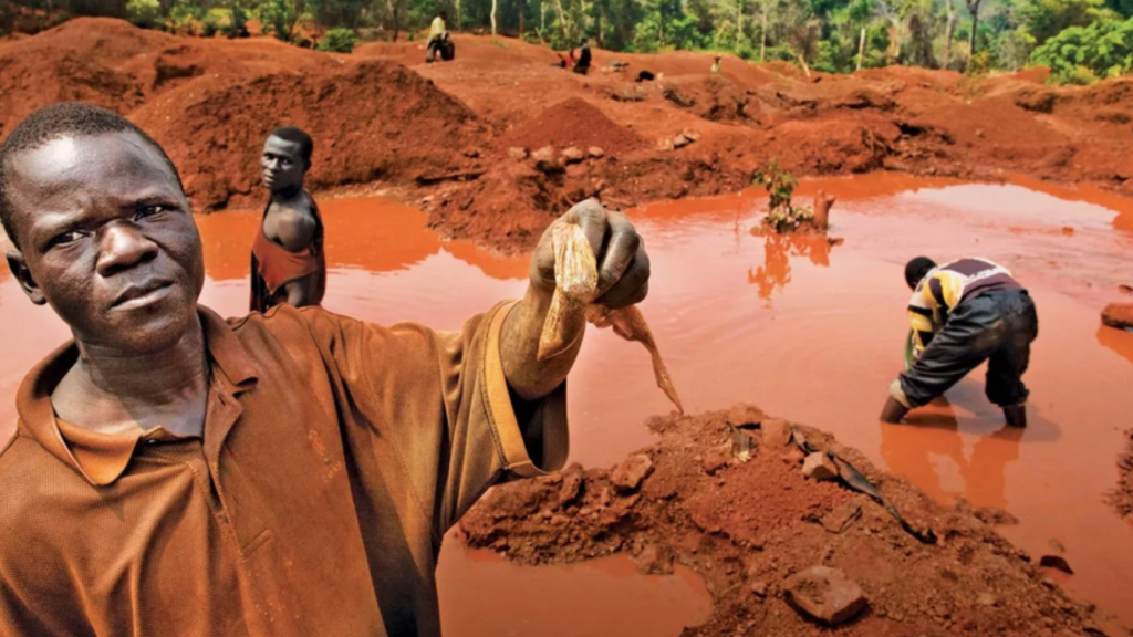A miner shows a bag containing coltan in the Democratic Republic of the Congo