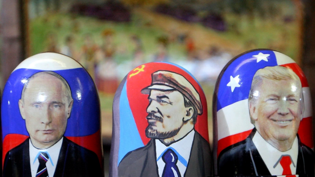 Russian wooden matryoshka dolls depict President Donald Trump, Vladimir Lenin, a Soviet politician and statesman and Russian President Vladimir Putin on the Red Square in Moscow