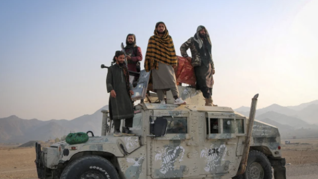 Taliban soldiers pose as they stand on a Humvee in Afghanistan’s Nangarhar province, which shares a border with Pakistan on February 28, 2026. 