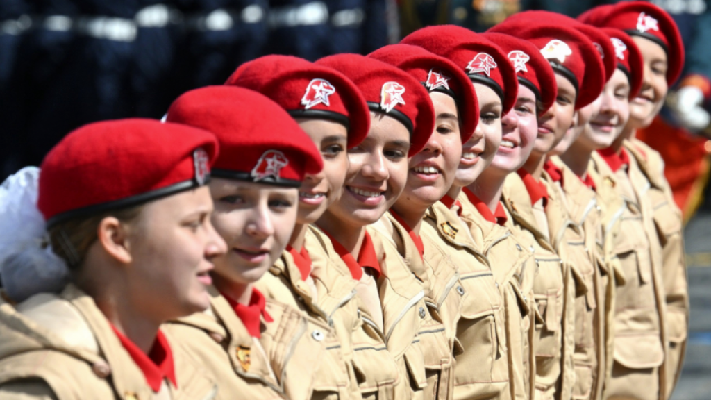 Russian women cadets march past the review stand during the annual Victory Day military parade through Red Square