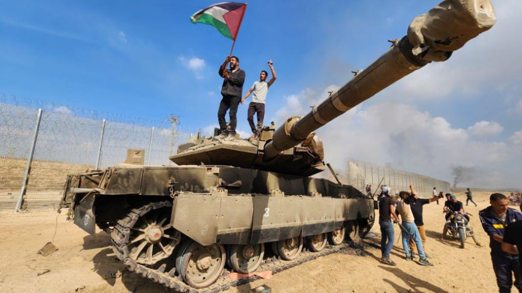 October 7 Israeli tank Palestine flag