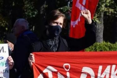 Protestor holding banner