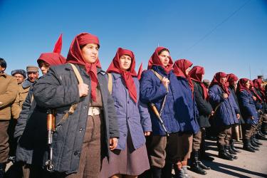 Armed women from one of the revolutionary militias defending the revolution against US backed jihadists