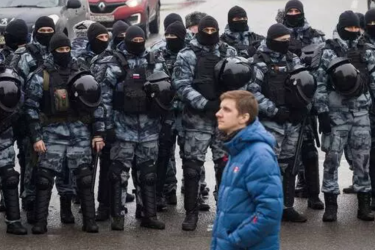 Russian riot police stand watch on the fringes of Alexei Navalny’s funeral in Moscow, 1 March 2024.