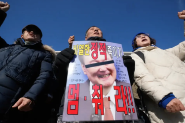 Members of South Korea’s opposition Democratic Party protest against President Yoon Suk-yeol outside the national assembly in Seoul.