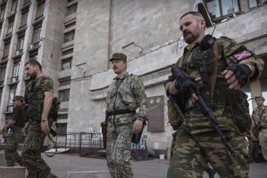 Former leader of the separatists in the self-proclaimed Donetsk People's Republic, Igor Strelkov (Girkin), with his guards near the Donetsk city administration building, July 10, 2014. Photo: from open sources