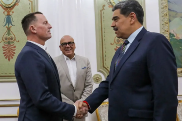 Venezuelan President Nicolas Maduro (right) greets the special envoy of US President Donald Trump, Richard Grenell, in Caracas. 