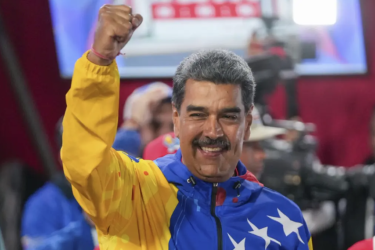 Maduro raising fist