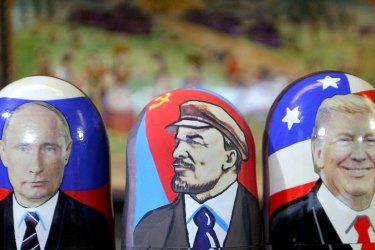 Russian wooden matryoshka dolls depict President Donald Trump, Vladimir Lenin, a Soviet politician and statesman and Russian President Vladimir Putin on the Red Square in Moscow