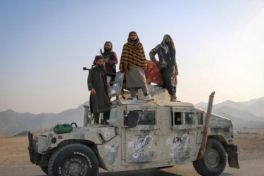 Taliban soldiers pose as they stand on a Humvee in Afghanistan’s Nangarhar province, which shares a border with Pakistan on February 28, 2026. 