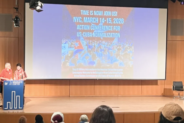 Ike Nahem (left) of the New York-New Jersey Cuba Sí Coalition welcomes delegates on March 14, 2026, to the Action Conference ‘Cuba Under Siege: Strategies for Resistance and a United Response.’ (Photo: Argiris Malapanis / World-Outlook)