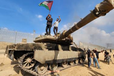 October 7 Israeli tank Palestine flag