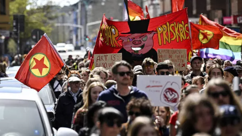 Supporters of the Swedish Left Party march through Malmö on International Workers’ Day, 1 May 2023.