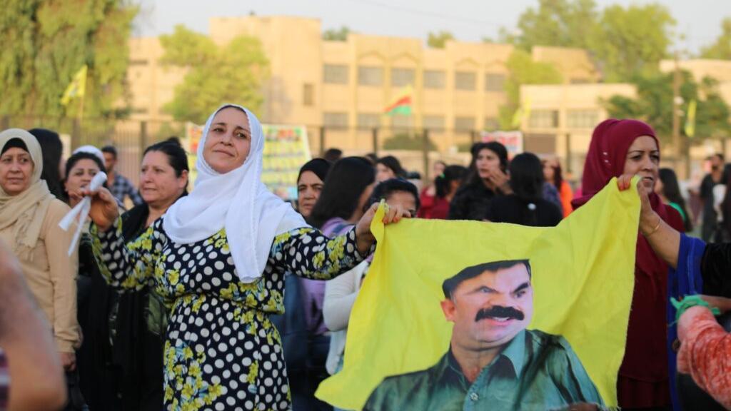 A Kurdish woman dancing at a celebration of the revolution in Qamishli, 2023. Photo by Anna Rebrii